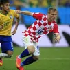 photo modric, ici face à neymar, devra mener son équipe à la victoire