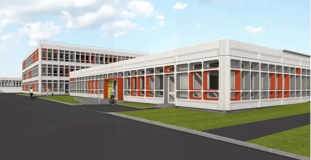 photo la couleur des façades rappelle celles du blason de la navarre. &copy; perspective atelier delaroux – architecte dplg