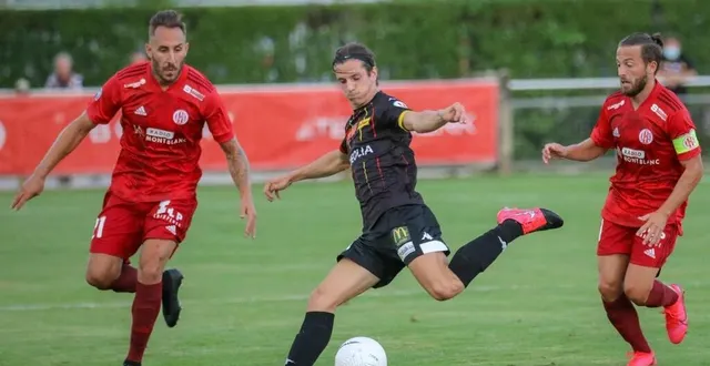 photo félix tomi (buteur à la 45e, en noir) et les manceaux prennent un point décevant. &copy; photopqr/le dauphine/sylvain muscio
