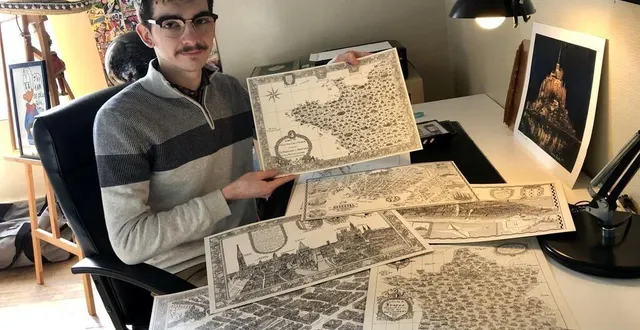 photo  pablo raison avec ses cartes, réalisées à l’encre de chine.  &copy;  ouest-france 