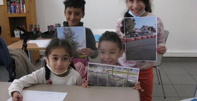 photo  islam, anaïs, isra et saïd ont montré beaucoup de talent pour photographier le quartier. ils ont écrit des messages et dessiné leurs photos.  &copy;  ouest-france 