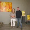 photo florence boisjoly et olivier hesnard devant une peinture de florence.