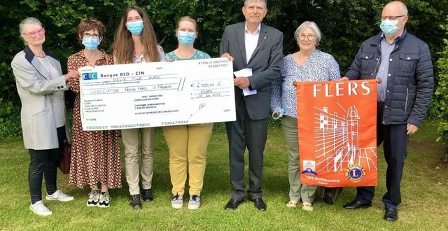 photo  les membres du lions club ont remis un chèque de 2 000 € à l’association les petits frères des pauvres, ce jeudi 10 juin 2021, à saint-georges-des-groseillers, dans l’orne.  &copy;  ouest-france 