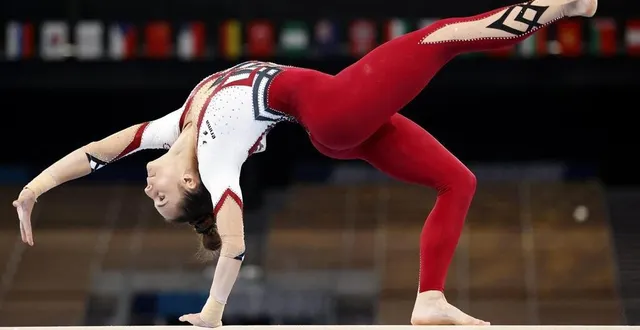 photo  pauline schaefer-betz et les gymnastes allemandes se sont présentées sur le praticable en combinaison, et non en justaucorps, la tenue traditionnelle, lors du concours par équipe des jeux olympiques de tokyo, dimanche 25 juillet.  &copy;  epa/maxppp 