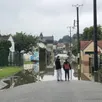 photo  la rue de la touques, à gacé, a été inondée, mardi 13 juillet. 