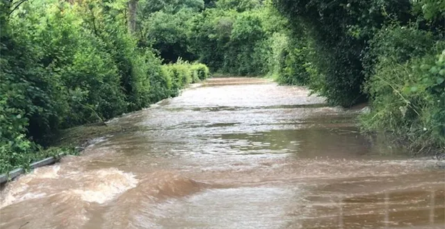 photo  les rues de sap-en-auge lors des inondations du 22 juin.  &copy;  dr 