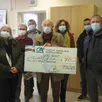 photo  la banque verte a remis un chèque de 750 € à l’association les montgommery. 