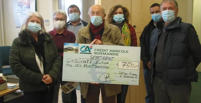 photo  la banque verte a remis un chèque de 750 € à l’association les montgommery.  &copy;  ouest-france 
