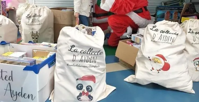photo  ayden et ses parents ont apporté les plus de 680 cadeaux collectés pour les enfants hospitalisés au mans.  &copy;  marine thyreau 