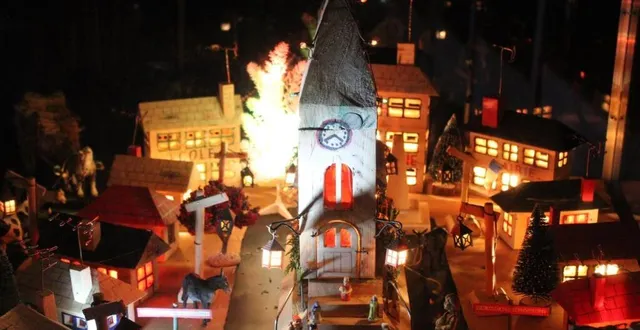 photo  monique et michel tronchet ont illuminé un village ressemblant à saint-aubin-de-locquenay, à côté de la crèche  &copy;  le maine libre 