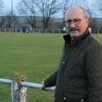 photo  jacky marchand, maire de trangé (sarthe), devant le terrain de football que la municipalité souhaite délocaliser afin d’y construire une quarantaine de logements. 
