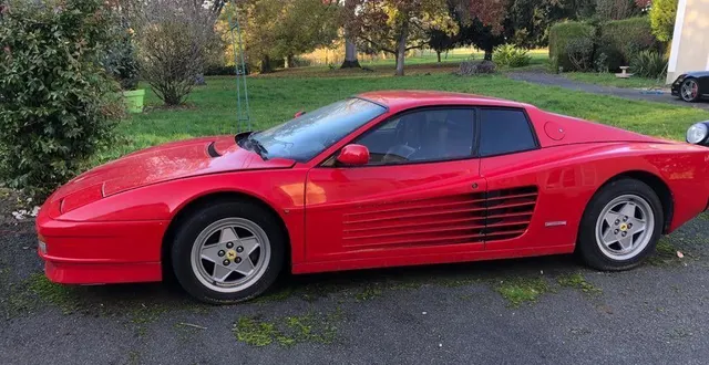photo  cette ferrari testarossa a été adjugée 96 000 € (frais compris) samedi 29 janvier 2022 à alençon.  &copy;  dr 