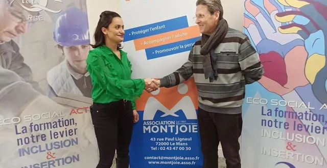 photo  christian vergne, président de l’association montjoie avec la représentante de qwanty.  &copy;  montjoie 