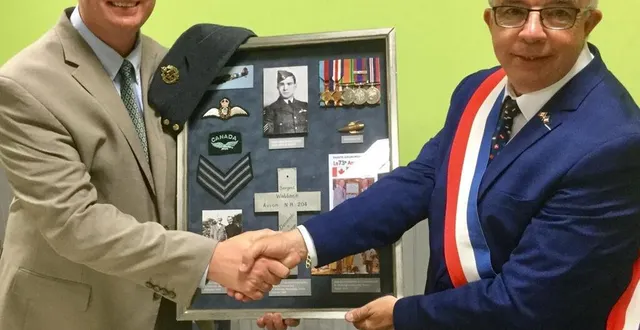 photo  chaque 22 août, le souvenir du sergent wallace est au cœur de la commémoration de l’anniversaire de la libération de sainte-gauburge-sainte-colombe (orne).  &copy;  archives ouest-france 