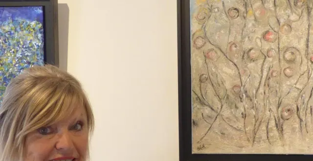 photo  annie pelzak et ses fleurs danseuses.  &copy;  ouest-france 