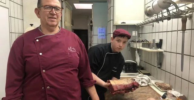 photo  dominique tulane (ici avec ryan, un apprenti) dirige depuis 1993 la boucherie créée par son père à argentan en 1964.  &copy;  ouest-france 