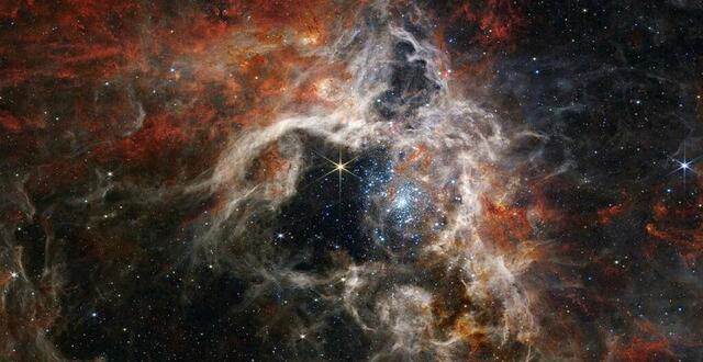 Photo taken on September 6, 2022, this image shows a nursery of stars dubbed the Tarantula Nebula, captured in great detail by NASA's James Webb Telescope. 