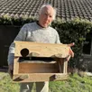 photo  jean-yves renvoisé avec l’un de ses nichoirs. ils peuvent abriter une chouette chevêche et sa portée. 