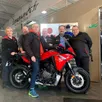 photo  jean-luc, jean-paul, jean-claude, jean-luc et pascal, ici chez leur partenaire le mans moto, vont rejoindre marseille pour embarquer vers le maroc. 