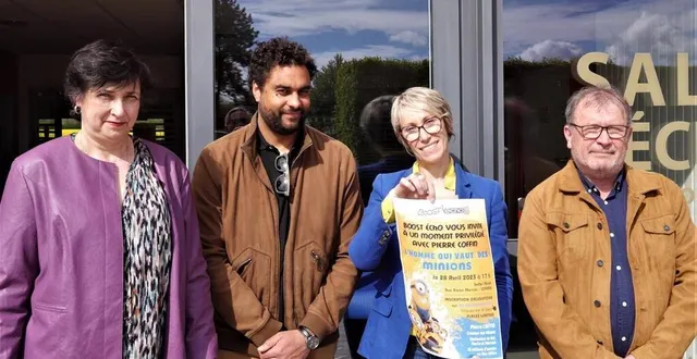 photo  corinne peschaud, vice-présidente de boost echo, entourée de membres de l’association, présente l’affiche de la rencontre avec pierre coffin, le créateur des minions.  &copy;  ouest-france 