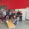 photo  mercredi 31 mai 2023, dans les ateliers menuiserie de giel don bosco, clément, à gauche du jeu de cornhole et mathieu, à droite, qui sont à l’initiative de cette réalisation et en présence des membres de la direction des écoles giel don bosco et sainte-thérèse, de putanges, de l’ogec, de professeurs et élèves ont remis un jeu de cornhole et une console en bois à l’école sainte-thérèse. 