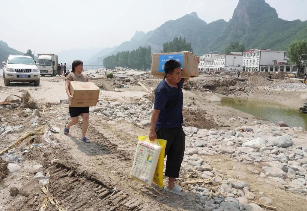 EN IMAGES En Chine Des Inondations Dans La Province De Heibei Font Au