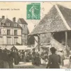 photo carte postale représentant l’ancien marché d’écouché-les-vallées.