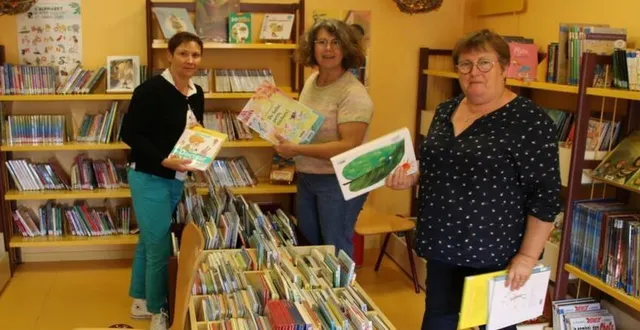 photo  malika besnard, présidente (à droite), accompagnée de deux membres de l’association page en page.  &copy;  ouest-france 