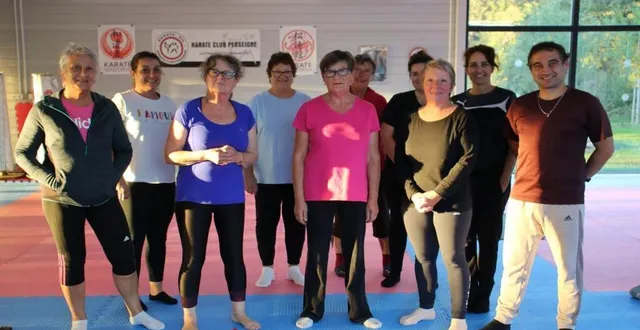 photo  au dojo, martine prodhomme, et boris gesbert ( à droite), accompagnés d’une partie des adhérents.  &copy;  ouest-france 