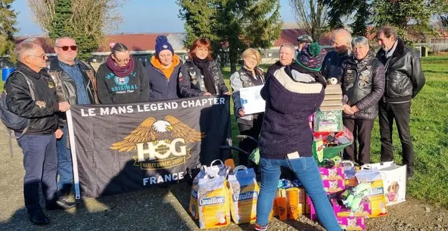 photo  l’association de bikers « le mans legend chapter » a remis un chèque de 500 € à maryelle beasse, présidente de la lda, et de la nourriture pour animaux d’une valeur de 500 €.  &copy;  ouest-france 