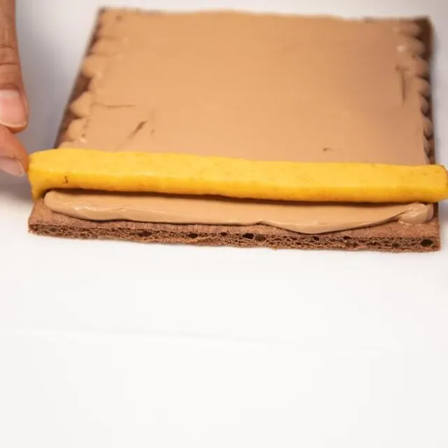 Placer le boudin de compotée de clémentines. DAVID ADEMAS / OUEST-FRANCE photo placer le boudin de compotée de clémentines. © david ademas / ouest-france