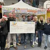 photo une délégation de commerçants adhérents de la dynamique athisienne a remis à la mère de nathan un chèque de 5 000 €, à la clôture du marché de noël.