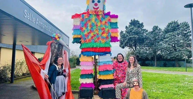 photo  l’association des parents d’élèves neuville, a défilé avec le bonhomme carnaval et les enfants accompagnés de la fanfare sacor music’.  &copy;  le maine libre 