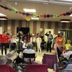 photo les membres du conseil jeunes de rouillon et les résidents ont fêté carnaval en musique.