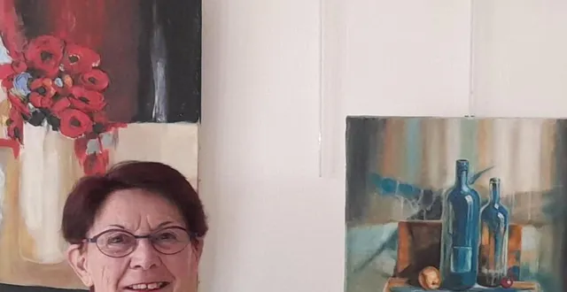photo  jeanine cheneau, devant quelques tableaux présentés pour la première fois à la mairie.  &copy;  ouest-france 