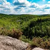 photo  en suisse normande (orne), le panorama vu depuis les falaises de la roche-d’oëtre, le phare touristique de flers agglo. 