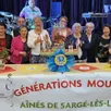 photo  les membres du comité d’administration du club sargéen autour du gâteau d’anniversaire. 
