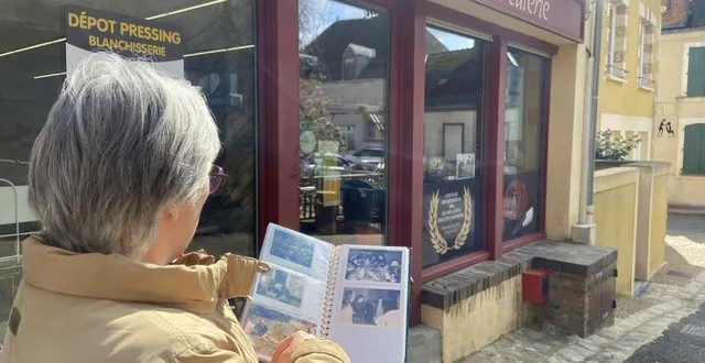 photo  photos en main, catherine lejard replonge à l’époque où, à la place de l’actuelle épicerie, se tenait l’entreprise de son oncle.  &copy;  le maine libre 
