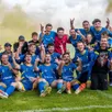 photo les footballeurs de l’anille bray laissent éclater leur joie après leur montée en d1.