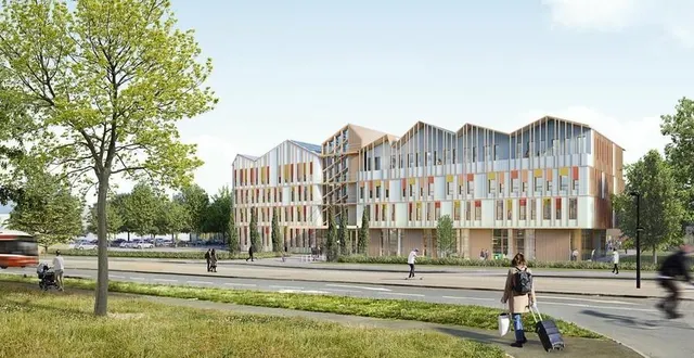 photo  une vue d’architecte du bâtiment dédié à la formation théorique, du futur centre national de formation de la sncf, au mans. ici, depuis le boulevard demorieux.  &copy;  a+ architecture 