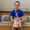 photo  jules hecker, 8 ans, originaire de toulouse, est champion de france de puzzle dans la catégorie des moins de 10 ans. 