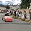 photo la première course de caisses à savon de loué, en juillet 2023, avait attiré beaucoup de monde dans les rues de la commune.