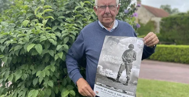 photo  thierry clérembaux, maire de fleuré (orne), avec une affiche du documentaire sur la 2e db.  &copy;  ouest-france 