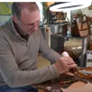 photo  yvan de la villèsbrune en démonstration à la boutique du moulin. 