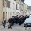 photo le défilé, conduit par claude jeanne, a mené le cortège de la mairie au monument aux morts de tuffé.