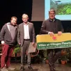 photo cécile chauveau, conseillère municipale ; florian lebrun, chef du service voirie environnement, et daniel coudreuse, le maire, ont reçu la première fleur de brûlon le 13 novembre 2024, à mouchamps (vendée).