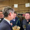 photo  charles deparis, producteur laitier aop pour la marque gillot, a fait goûter du camembert à gabriel attal, en visite ce lundi 25 novembre 2024, à la foire de la sainte-catherine de briouze, dans l’orne. 