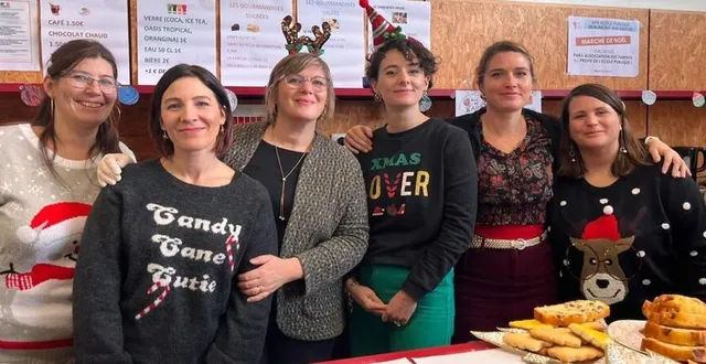 photo  virginie dagorn, au centre, avec une partie de l’équipe de l’ape.  &copy;  le maine libre 