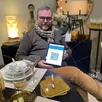photo sylvain montfort présente un qr code qui permet de payer ses achats dans son magasin d’argentan en cryptomonnaie.