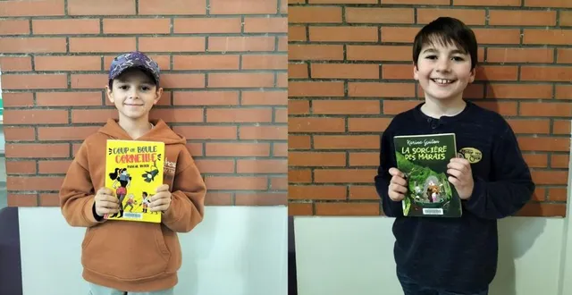 photo  les deux écoliers finalistes de la finale locale, clément, de maurice-genevoix, et paul, de notre-dame.  &copy;  médiathèque la parenthèse 